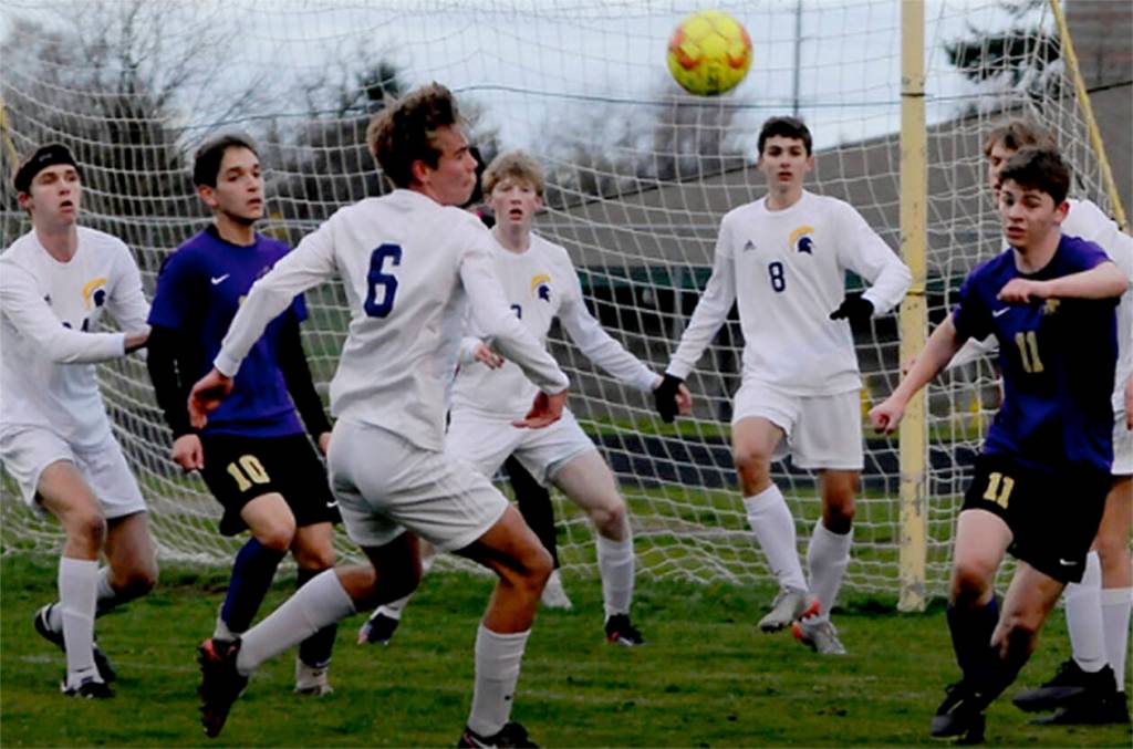 It was crowded in front of the goal as Spartan Calvin Moe (6) tries to score. Michael Dashiell/Courtesy Photo