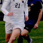 Sampson Murchie (21) of Bainbridge dribbles the ball up the field against Sequim. Michael Dashiell/Courtesy Photo