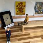 The gallery includes people, furniture and, of course, artwork.