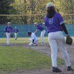 CoCo Black is safe at second after getting caught in a rundown as Zach Edwards of NK applies the tag.