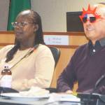Clarence Moriwaki put on some funny red glasses that were passed around at the retreat to show that humor is needed.