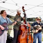 Songbird entertains volunteers working on Earth Day.