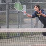 Aya Gatto smashes a forehand down the line against the Bucs.