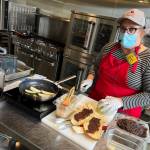 Joanna Bressel-Wilder in the demonstration kitchen making bacon jam for sandwiches and appetizers.