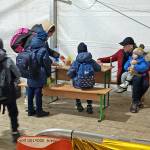 A father who brought his family to the border says goodbye to his wife and children before returning to Ukraine because men between the ages of 18 and 60 are barred from leaving the country.