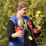 Teacher Meloni Courtway explaining how to prepare nursery plants for the garden.
