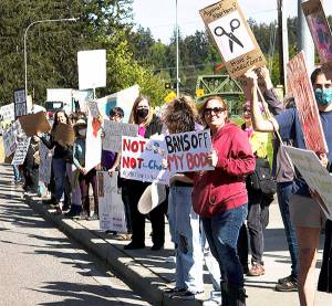 Protesters line Highway 305 near Agate Pass Bridge Saturday. David Hammel/Courtesy Photos
