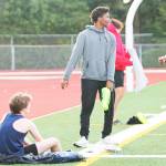 The 4 by 100 relay team from Bainbridge tries to relax before their race.
