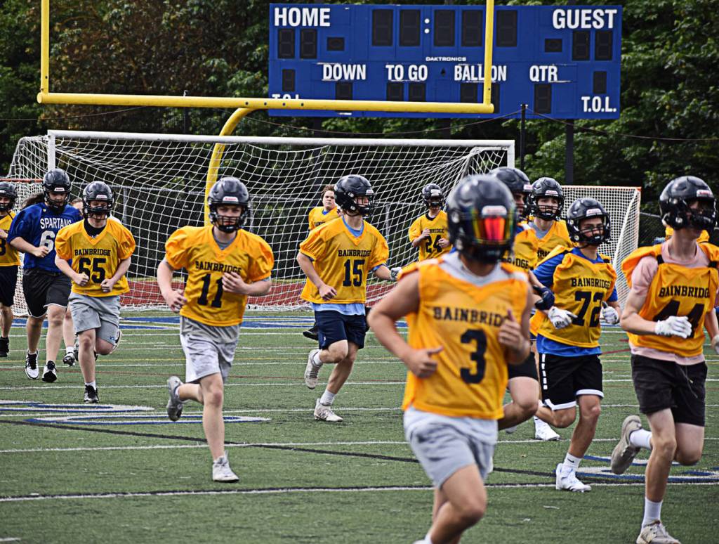 Nearly 70 Bainbridge High School students are warming up for spring football practice.