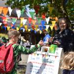 Ordway Elementary School substitute teacher Kathy Dudgeon shares bubbles with kids on the last day of school.