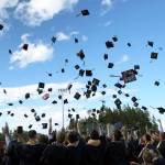 Caps fill the air at the end of commencement June 12 at BHS Memorial Stadium. Nancy Treder/Bainbridge Review photos