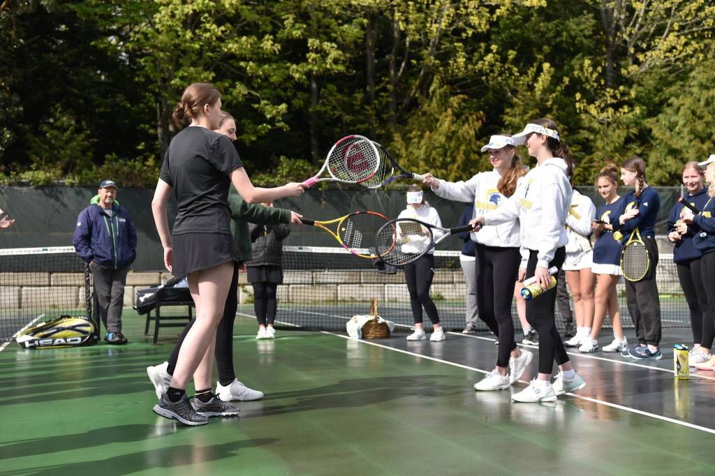 BHS girls tennis team prepares for a match.