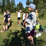 Bainbridge High School's cross country coach Dana Amore was one of the first women to compete for University of Michigan's women's track team. Nicholas Zeller-Singh/Kitsap News Group Photos