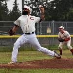 Bainbridge Island head baseball coach Geoff Brown pitched for the Reds team at the old-timers game.