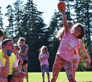 This young girl gave it her all throwing the shot put. Nicholas Zeller-Singh/Bainbridge Review Photos