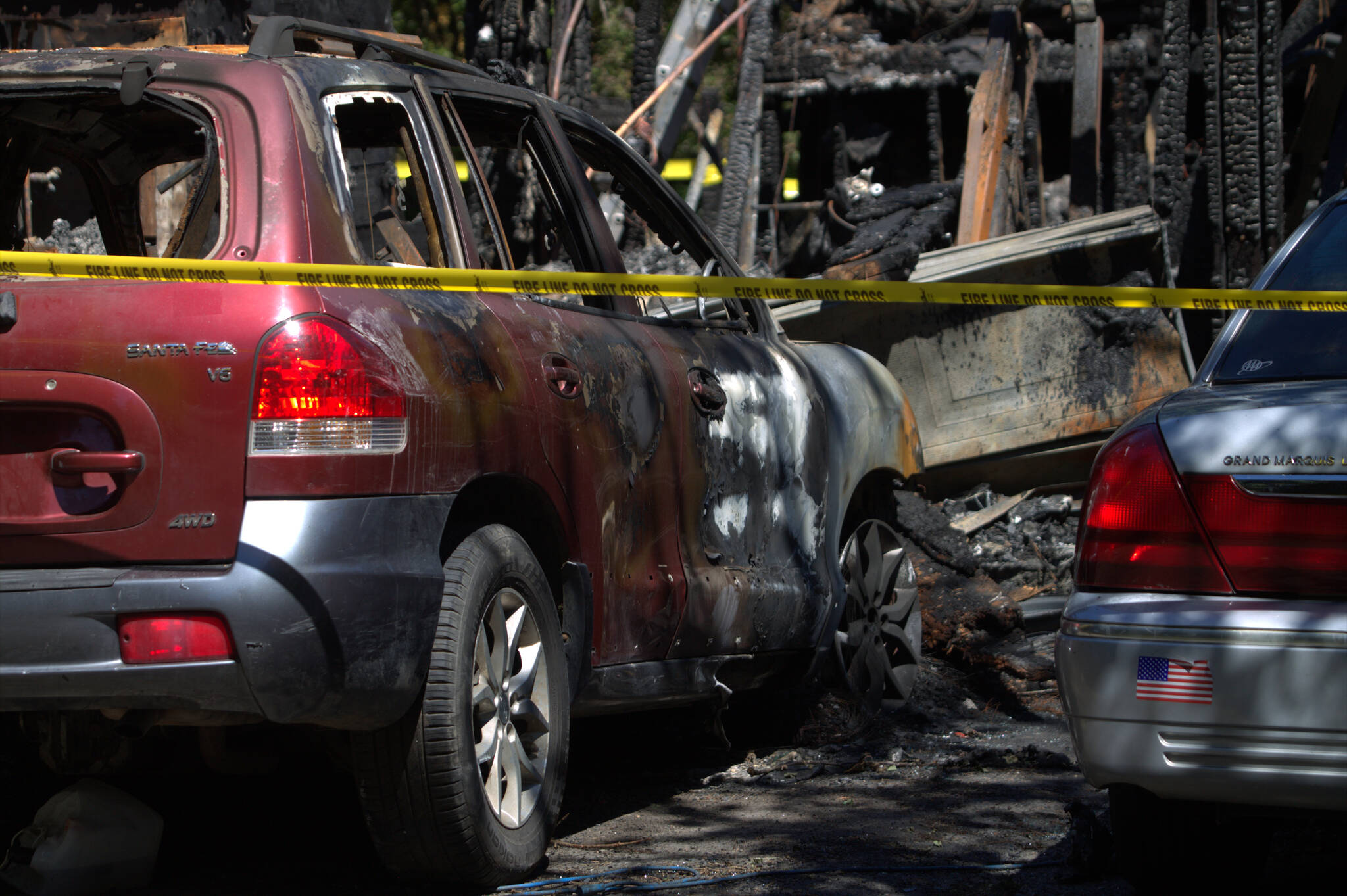 Cars sitting next to the house also took heavy damage during the fire.