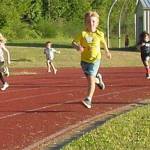 A group turns the corner on the way to the finish line.
A group turns the corner on the way to the finish line.