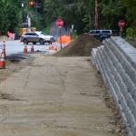 Some nice brickwork serves as a wall next to a wide sidewalk under construction. Steve Powell/Bainbridge Island Review