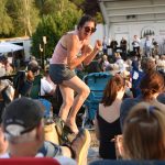 A visitor dances to the music.