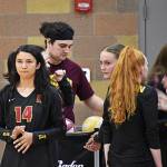 Middle blocker Taizah Franklin leaves Kingstons huddle as she prepares to take the court.