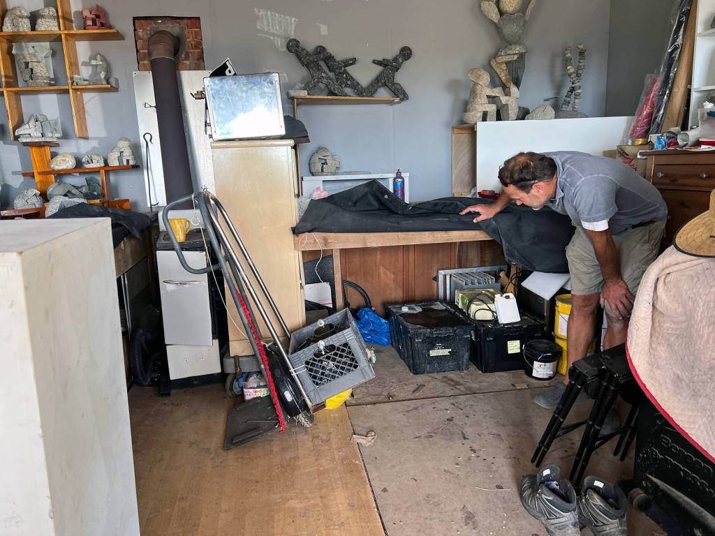 Currier assesses the area where his tools were stored and stolen during Labor Day weekend.
