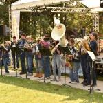 The Bainbridge Island High School Marching Band kicks off the festival with pep songs.