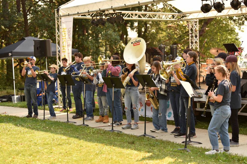 The Bainbridge Island High School Marching Band kicks off the festival with pep songs.
