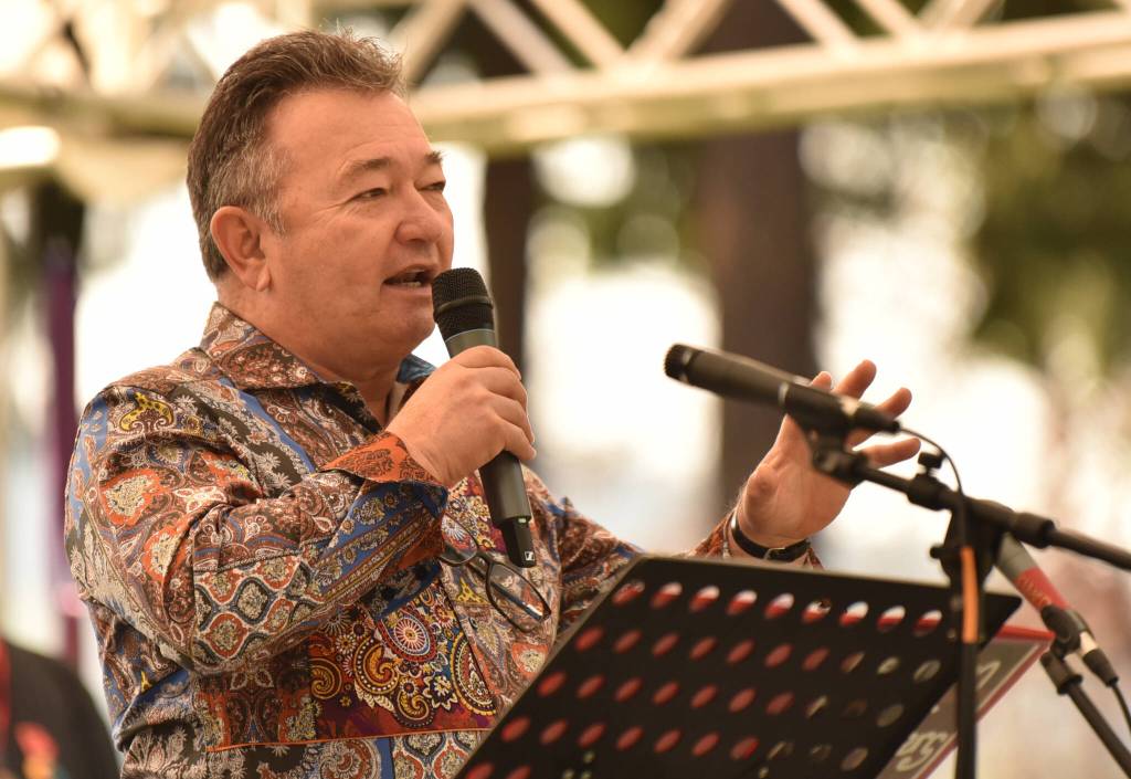 Bainbridge Island city manager Blair King welcomes visitors to the festival.