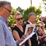 Guests sing the British National Anthem during the service.