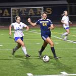 Grace Rich holds off the forward so Bainbridge can keep the clean sheet.