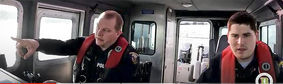 Officers Brent Miller and Jon Bingham in their marina boat. Courtesy Photo