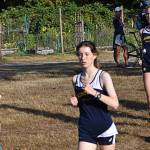Coach Anne Howard Lindquist coaches Mayzie Carleton one last time at Battle Point Park.