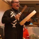 Joseph Martin, executive board chair for the Indipino community, sings an honor song dedicated to the 36 indigenous mothers who were the founders of the Indipino community on Bainbridge.