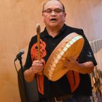 Chief Dale Harry leads the welcome song for the community gathering.