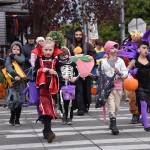 Nancy Treder/Kitsap News Group Photos
Trick-or-treaters cross Madison Avenue on Halloween in Winslow.