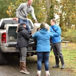 James Powell, SR3 Response Program manager, supervises the unloading of the seal pup cages at the Fort Ward boat launch.