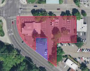 The Bainbridge police station site in light red, with the notch in purple. Courtesy Image