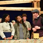 Meg Murry with her mother, played by Aiyanna Clark, and her brother, played by Camden Diercks.