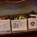 Care packages destined for college students await for final items before shipping.