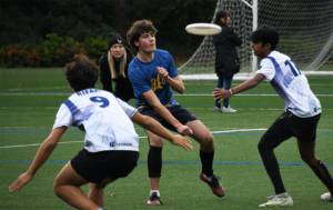 Tiarnan Babcock ONeill releases a disc through defensive traffic against Eastside Prep, in the Washington State high school Ultimate tournament. Courtesy Photos