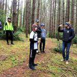 Courtesy Photo
Mike Blossom shows visitors the terrain of the bike park.