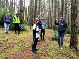 Courtesy Photo
Mike Blossom shows visitors the terrain of the bike park.