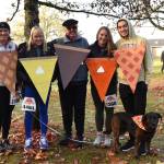 The Cox and Kusuda family ran the race dressed as slices of pie for Thanksgiving day which included; Kristin Cox as lattice, Leslie Cox as lemon, David Cox as pecan, Kaylee Kusuda as pumpkin and Kyle Kusuda as the cherry slice along with their dog Bear.