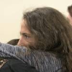 Two of the victims in the case of Stephen Tyler Clayton embrace, one of them in tears, following the acceptance of the plea deal. Elisha Meyer/Kitsap news Group Photos