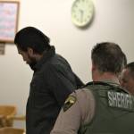 Stephen Tyler Clayton is handcuffed and led away by law enforcement following the plea deal being accepted.