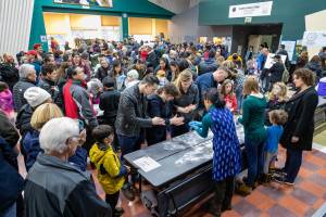 Guests wait their turn to make mochi to eat and welcome the New Year. Jim Reitz Courtesy Photos