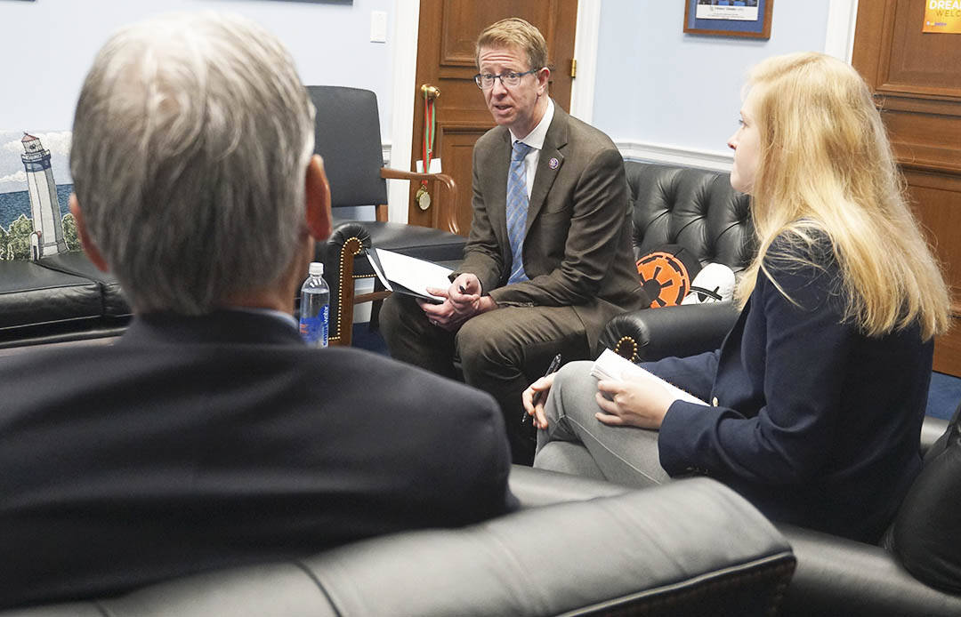 Rep. Derek Kilmer talks at a meeting.
