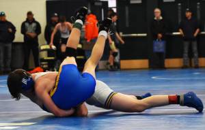 Bremertons Gabe Riddle pinned Bainbridges Parker Kruglik in one of the first matches of the tournament. Nicholas Zeller-Singh/Kitsap News Group Photos