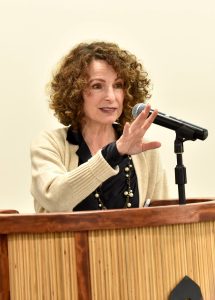 BI Poet Laureate Michele Bombardier greets guests at the first poetry open mic night. Nancy Treder/Kitsap News Group Photos