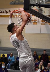 Cade Orness finished the game with three dunks against Kingston. Nicholas Zeller-Singh/Kitsap News Group